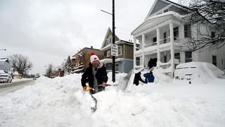 Residents of Buffalo, New York, are digging holes after a blizzard.